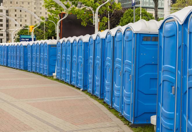 a row of portable restrooms at a trade show, catering to visitors with a professional and comfortable experience in Buchanan